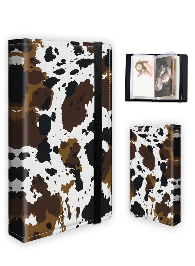Tudguiloae Photo Album 4x6 60 Pockets Photos, PU Leather Cover Portable Small Photo Albums with Elastic Band, Family Wedding Anniversary Baby Memory Pictures Book, Cow Print - Image 1